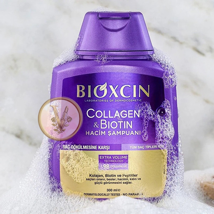 شامپو ضد ریزش مو گیاهی بیوکسین مدل کلاژن بیوتین رنگ بنفش حجم 300 میلی لیتر در ویونا